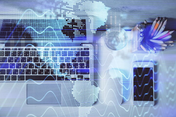 Obraz premium Multi exposure of forex graph drawing over desktop background with computer. Concept of financial analysis. Top view.