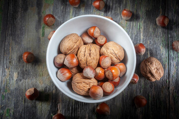 Bunch of Dried Walnuts and Hazlenuts in a Bowl
