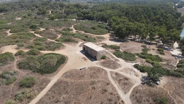 Aerial view of old abandoned traditional stone house in Mediterranean countryside, Ruins of an old building near a river, Israel
