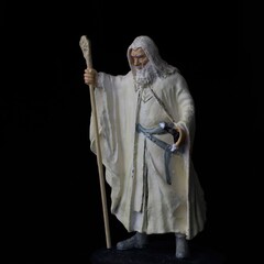 person in a suit with a scarf