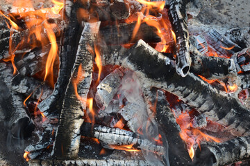 red-hot coals in the fire