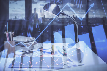 Double exposure of stock market graph drawing and office interior background. Concept of financial analysis.