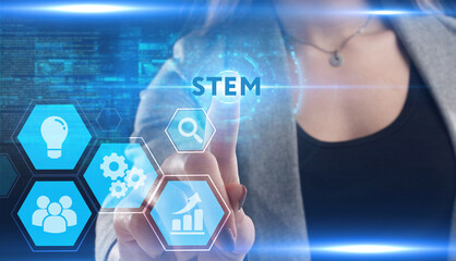 Business, Technology, Internet and network concept. Young businessman working on a virtual screen of the future and sees the inscription: STEM