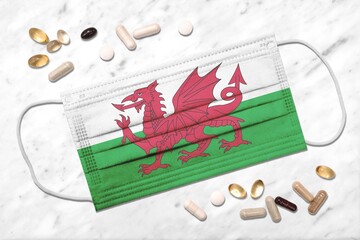 Face mask with flag of Wales during coronavirus pandemic