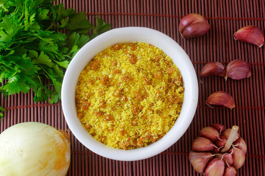Brazilian farofa. Traditional dish of Brazil cuisine made with manioc flour, widely used in festivities and at Christmas