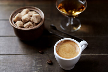 Cup of coffee on rustic wooden background. Close up.	