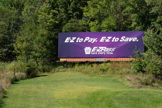Lehighton, Pennsylvania - Sept. 5, 2020: Bilboard for E-Z Pass by the side of the Pennsylvania Turnpike Northeast Extension.