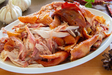 Roast chicken served i a plate close up. Chinese food