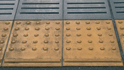 yellow safety line on the train platform