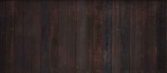 暗い色合いの木材でできたボードの背景テクスチャー