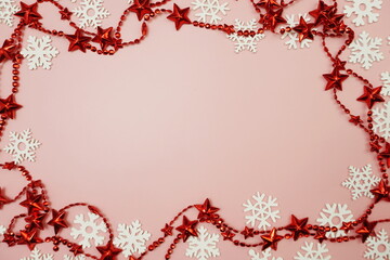 Christmas Ornament border frame on pink background