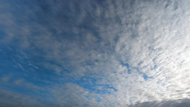Sky with magnificent cirrocumulus clouds. Time lapse.