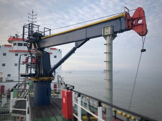 Hydraulic crane on the tanker ship