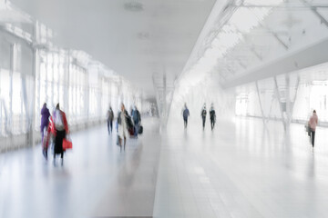 people in transport center airport bus and train station with a blurred background