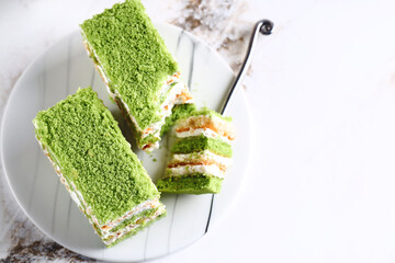 green cake with matcha tea for dessert