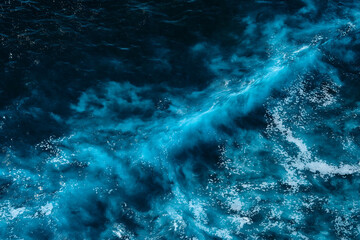 Aerial view to waves in ocean Splashing Waves. Blue clean wavy sea water