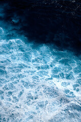 Aerial view to waves in ocean Splashing Waves. Blue clean wavy sea water