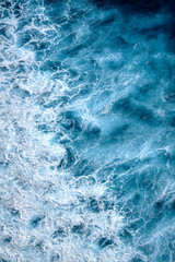 Aerial view to waves in ocean Splashing Waves. Blue clean wavy sea water