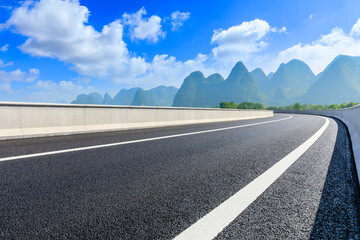 Asphalt highway and green mountain natural scenery in Guilin,China.