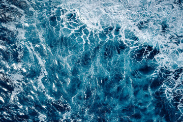 Aerial view to waves in ocean Splashing Waves. Blue clean wavy sea water