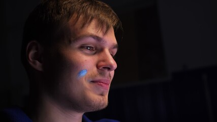 Artist copyist paint seascape with ship in ocean. Craftsman decorator draw as boat sail on blue sea with acrylic oil color. Draw finger, brush, knife palette. Indoor. Dark magic cinematic look.