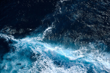 Aerial view to waves in ocean Splashing Waves. Blue clean wavy sea water