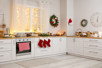 Interior of modern kitchen decorated for Christmas