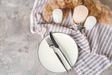 Simple table setting on grey background