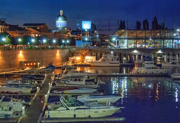 Fototapeta na wymiar Montreal at night, Canada. City port and buildings at sunset
