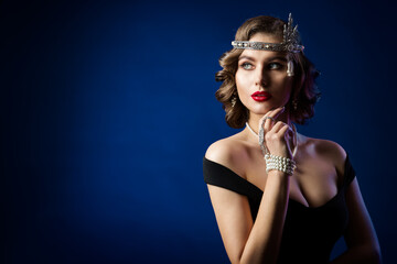 Retro Beauty Flapper Portrait, Woman Old Fashion Gatsby Hairstyle and Make Up, Blue Studio...