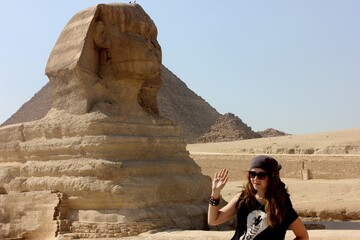 Egypt, Giza Girl tourist in the desert of ancient Cairo. Excursion. Pyramids.