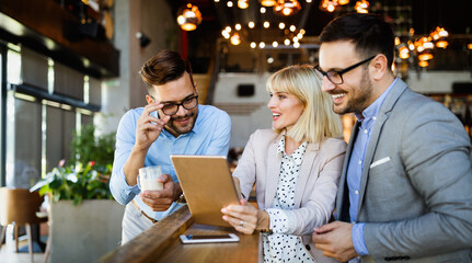 Business colleagues having conversation during coffee break