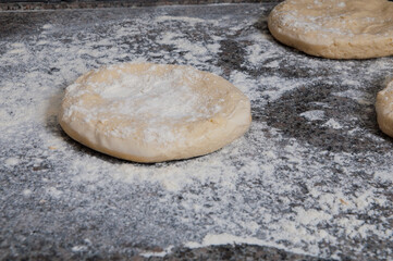pizza dough is on the table