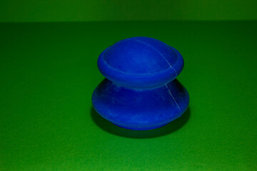 Massage jar on a green background