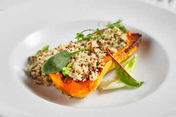 Stuffed butternut squash with fresh greens