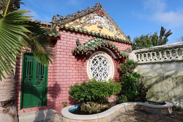 Hoi An, Vietnam, October 29, 2020: Detail of one of the facades of the Assembly Hall Of Fujian Chinese Temple in Hoi An