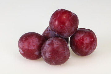 Sweet ripe plum isolated on white