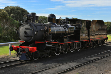 Walkers Ltd narrow gauge steam locomotive T251 (built 1917) with two carriages at Queenscliff railway station in Victoria, Australia.