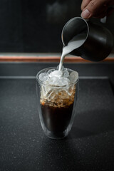 iced coffee put on black background