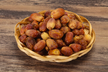 Sweet tasty dry dates in the basket