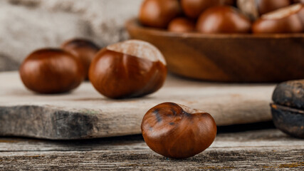 Chestnuts on an old wooden table