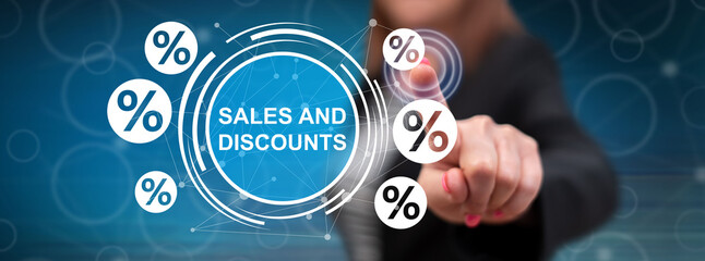 Woman touching a sales and discounts concept
