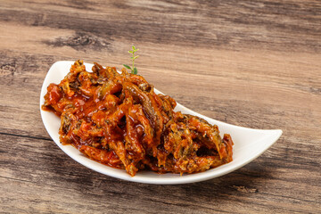 Canned anchovy in tomato sauce