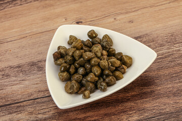 Tasty capers in the bowl