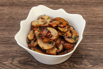 Roasted champignon with herbs and spices