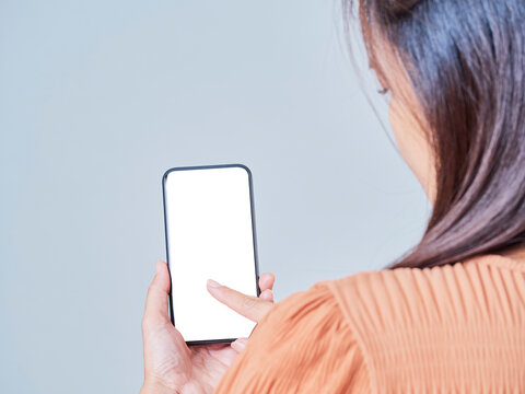 Close up of woman using smartphone
