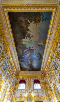 Peterhof , Saint Petersburg, Russia - 16 November, 2019: Interior of Peterhof Palace, commissioned by Peter the Great. Amazing room, walls and ceiling decorated with baroque gold ornaments