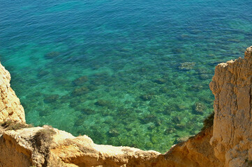 Great colorful nature on the Algarve Atlanyic coast with bizarre shaped sandstone rocks