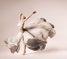 ballerina dancing in flowing dress
