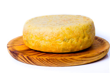 Spanish omelette on a wooden tray on white background